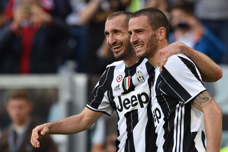 TURIN, ITALY - MAY 14:  Giorgio Chiellini (L) of Juventus FC celebrates after a goal with team mate Leonardo Bonucci during the Serie A match between Juventus FC and UC Sampdoria at Juventus Arena on May 14, 2016 in Turin, Italy.  (Photo by Valerio Pennicino/Getty Images)