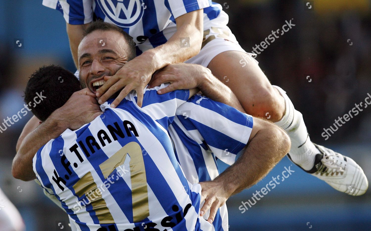 Mandatory Credit: Photo by Armando Babani/EPA/Shutterstock (7825980a) Migen Memelli of Fk Tirana is Congratulated by His Team Mates After Scoring For the Second and Equalizing Goal Against Kf Partizani During Their 138 Derby Match of the Albanian Premier League in Tirana Albania 18 April 2009 Match Ended with a 2-2 Albania Soccer Tirana Vs Partizani - Apr 2009