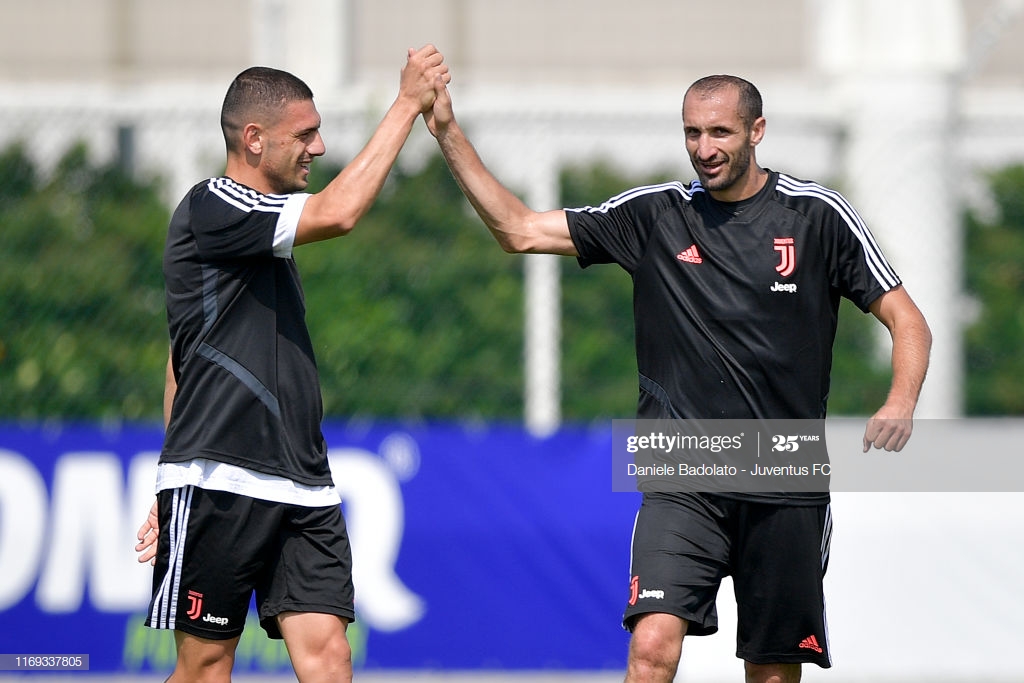 TURIN, ITALY - AUGUST 21: Juventus players Merih Demiral and Giorgio Chiellini during a training session at JTC on August 21, 2019 in Turin, Italy. (Photo by Daniele Badolato - Juventus FC/Juventus FC via Getty Images)