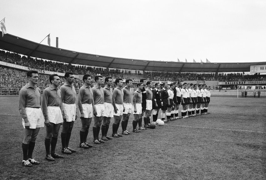 The French and German teams line up before the start of the third place play-off in the World Cup soccer tournament, in Gothenburg, Sweden, June 28, 1958. France defeated Germany by six goals to three. (AP Photo)