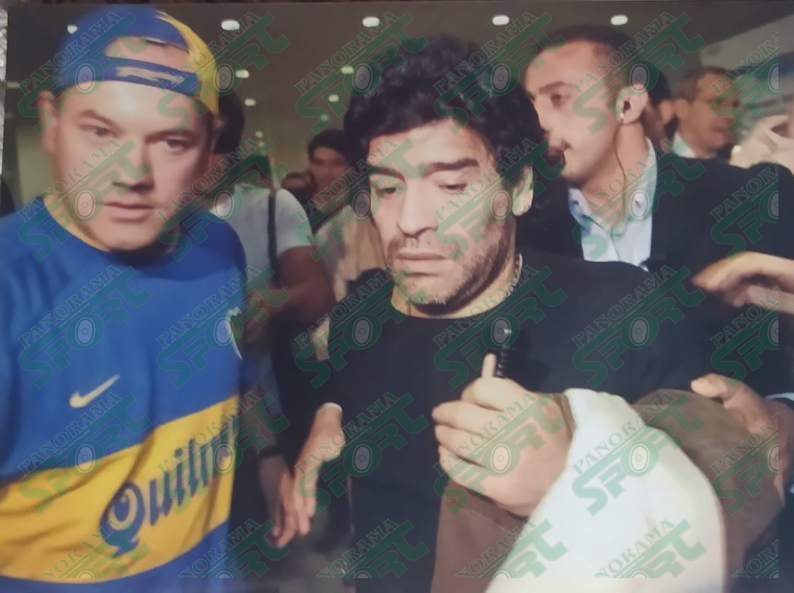 Maradona me shqiptarin Drini Caushi logo