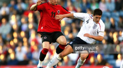 England's Gareth Barry and Albania's Besart Berisha  (Photo by Joe Giddens - PA Images via Getty Images)