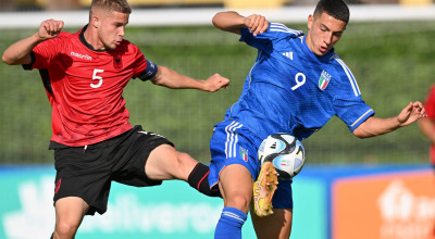 FLORENCE, ITALY - AUGUST 09: Arlind Kurti of Albania  competes for the ball with Alessandro Bolzan of Italy U19 during the match between Italy U19 and Albania U19 at Centro Tecnico Federale di Coverciano on August 09, 2023 in Florence, Italy. (Photo by Alessandro Sabattini/Getty Images)