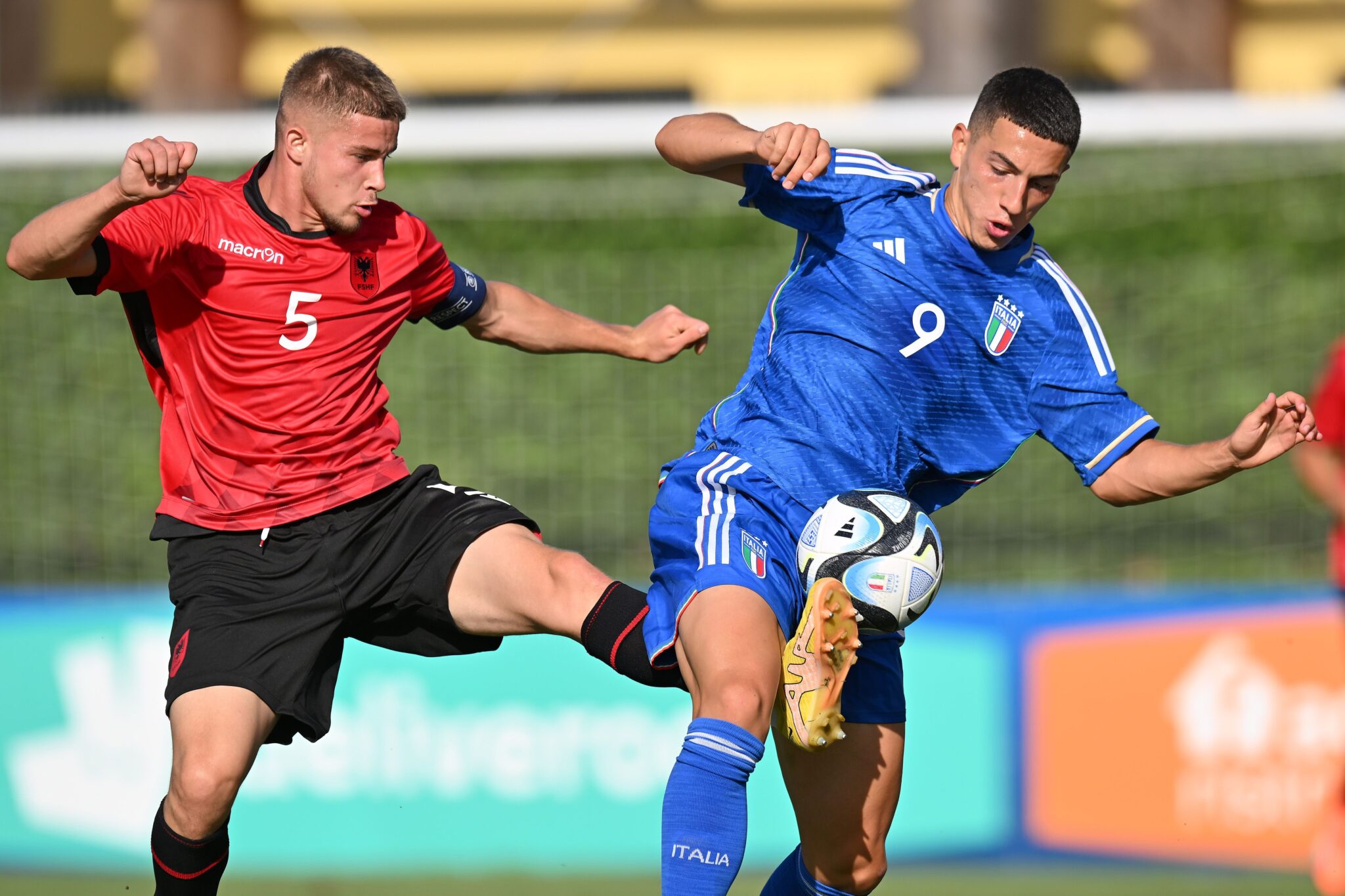 FLORENCE, ITALY - AUGUST 09: Arlind Kurti of Albania  competes for the ball with Alessandro Bolzan of Italy U19 during the match between Italy U19 and Albania U19 at Centro Tecnico Federale di Coverciano on August 09, 2023 in Florence, Italy. (Photo by Alessandro Sabattini/Getty Images)
