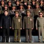 Kim-Jong-il-(front-L)-and-his-son-Kim-Jong-un-(R)-talk-as-they-visit-Mokran-Video-Company-in-Pyongyang12
