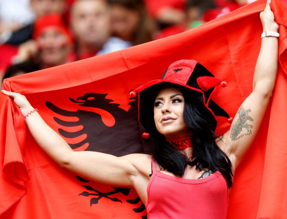 epa05367702 Supporter of Albania cheers prior to the UEFA EURO 2016 group A preliminary round match between France and Albania at Stade Velodrome in Marseille, France, 15 June 2016. (RESTRICTIONS APPLY: For editorial news reporting purposes only. Not used for commercial or marketing purposes without prior written approval of UEFA. Images must appear as still images and must not emulate match action video footage. Photographs published in online publications (whether via the Internet or otherwise) shall have an interval of at least 20 seconds between the posting.) EPA/GUILLAUME HORCAJUELO EDITORIAL USE ONLY