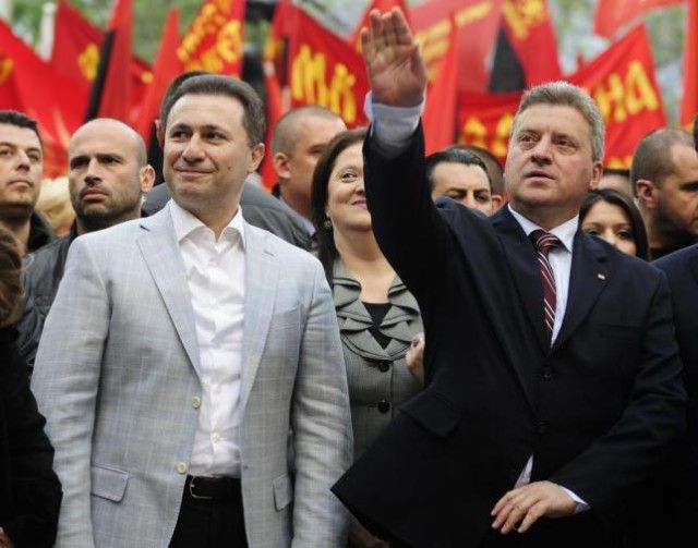 Presidential candidate of ruling VMRO-DPMNE Ivanov greets his supporters next to Macedonian PM  Gruevski during an election rally in Veles