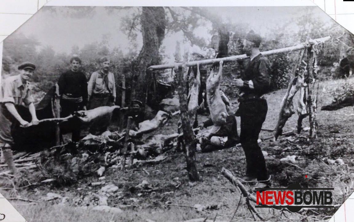 Çetë partizane duke bërë gati drekën me mish qingji në hell