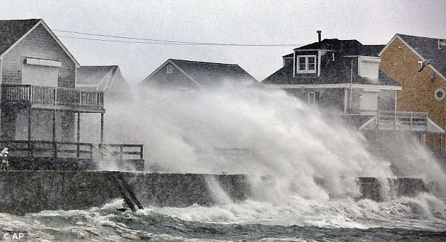 47C22F9100000578-5239217-Above_another_view_of_water_crashing_over_homes_in_Scituate_Mass-a-35_1515164222606
