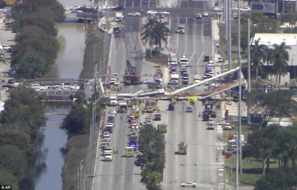 4A3A866100000578-5506597-Television_images_captured_from_helicopter_show_numerous_cars_th-a-68_1521141384326
