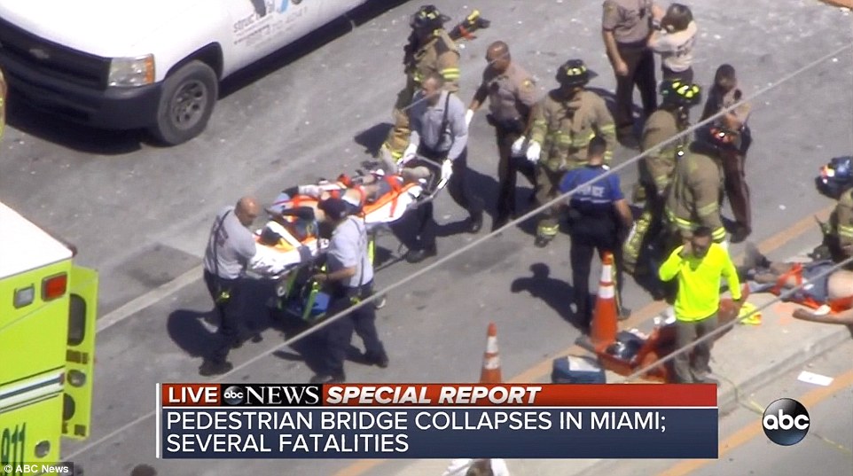 4A3A8E3A00000578-5506597-The_image_above_shows_a_victim_being_wheeled_away_from_the_scene-a-71_1521141384499