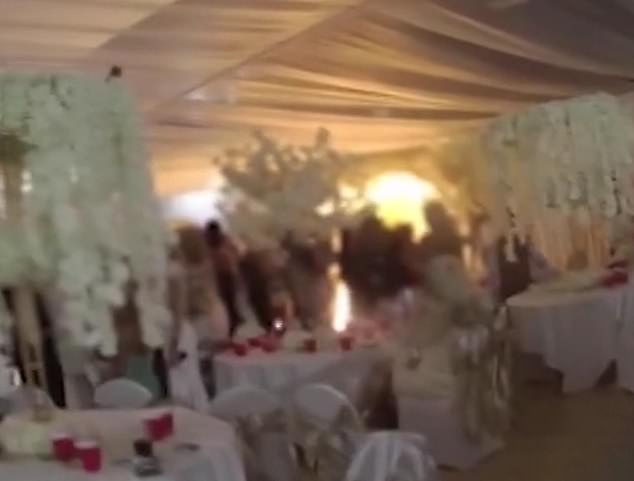 34451494-8845613-A_23_second_clip_of_the_event_showed_the_moment_guests_were_aske-m-15_1602802308281
