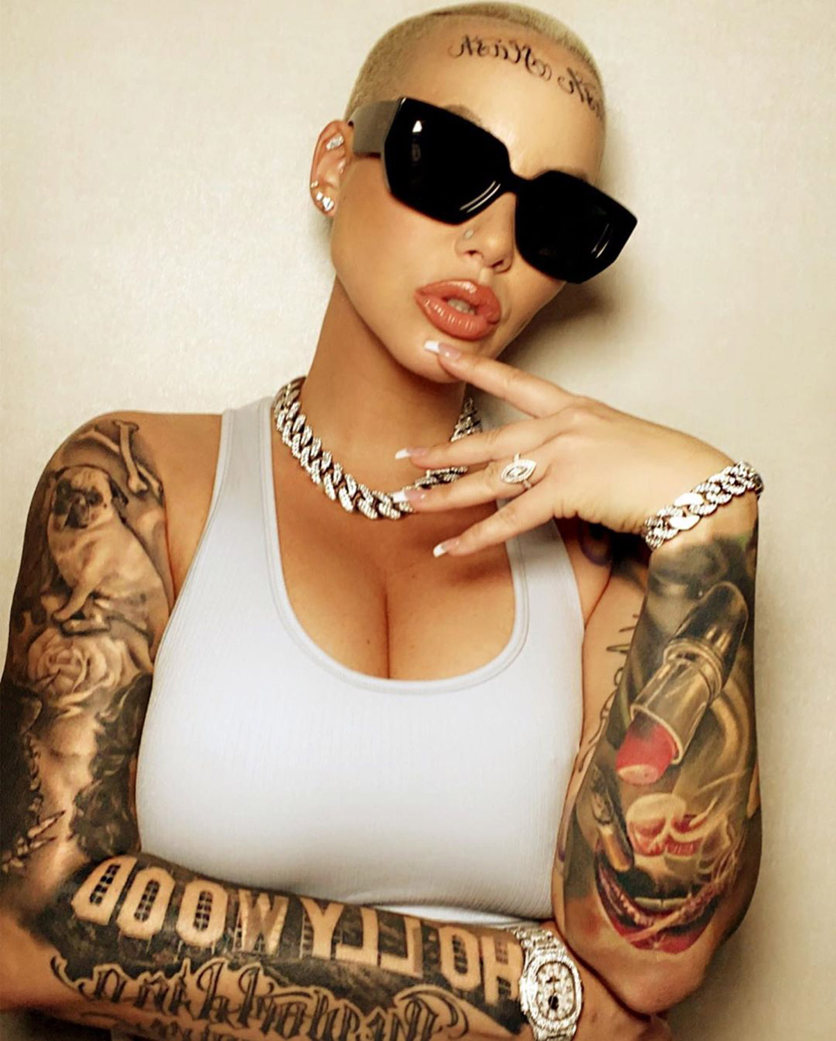 Amber Rose Claps Back After Trolls Slam Her New Face Tattoo Amber Rose/Instagram tout: first photo here https://www.instagram.com/p/B8dMJignYYF/ for inside: https://www.instagram.com/p/B8eaoW_HoSo/