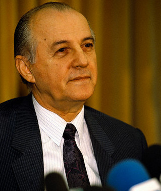 1980s, Tirane, Albania --- Ramiz Alia, leader of the communist Workers' Party, gives a press conference. --- Image by © Michel Setboun/Corbis