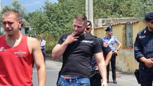 The desperation of little Elena's father, Giovanni Del Pozzo (C black T-shirt), the 5-year-old girl who disappeared and her body founded by her mother, in a field in Mascalucia, Catania, Italy, June 14, 2022. According to the mother, five-year-old Elena was kidnapped on 13 June by three men in the Sicilian town of Piano Tremestieri, near Catania. It was the woman who reportedly led authorities to the body after a night of questioning. ANSA/ORIETTA SCARDINO