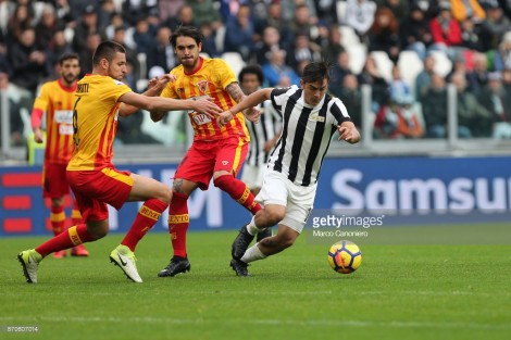 ALLIANZ STADIUM, TORINO, ITALY - 2017/11/05: Paulo Dybala of Juventus FC (R)  and Berat Djimsiti of Benevento Calcio (L)  in action during the Serie A football match between Juventus FC and Benevento Calcio.    Juventus players wear a special shirt released to celebrate the 120 year anniversary of Juventus Fc. Juventus Fc wins 2-1 over Benevento Calcio. (Photo by Marco Canoniero/LightRocket via Getty Images)