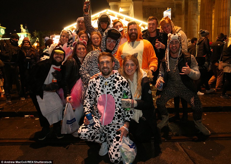 47AB544A00000578-5225397-Others_donned_fancy_dress_to_see_in_the_New_Year_in_the_centre_o-a-27_1514791408988