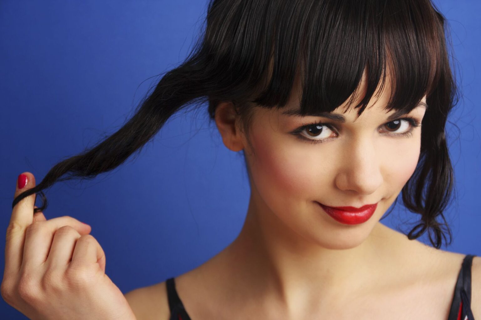 Beautiful lady playing with her hair
