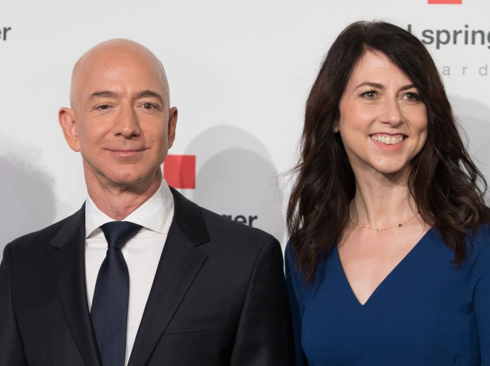 24 April 2018, Germany, Berlin: Head of Amazon Jeff Bezos and his wife MacKenzie Bezos arrive for the Axel Springer award ceremony. Bezos will be receiving the award later. Photo: Jörg Carstensen/dpa (Photo by Jörg Carstensen/picture alliance via Getty Images)