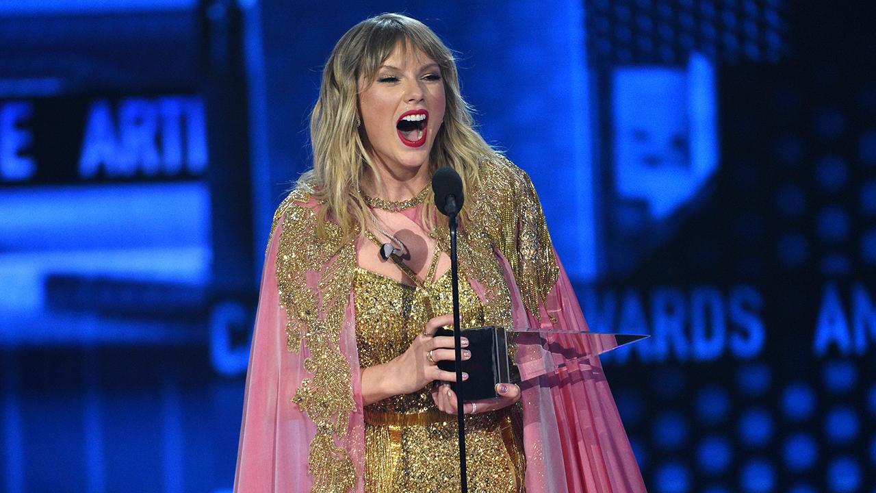 TAYLOR SWIFT