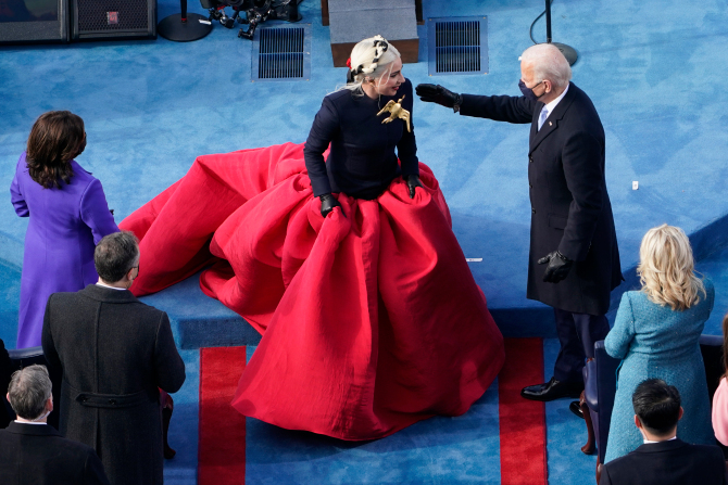 President-elect Joe Biden greets Lady Gaga during the 59th Presidential Inauguration at the U.S. Capitol in Washington, Wednesday, Jan. 20, 2021. (AP Photo/Susan Walsh, Pool)
